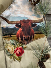 Rosie the longhorn puffer vest