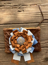 small leather ribbon clutch
