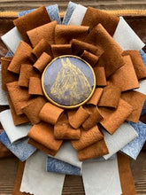 small leather ribbon clutch