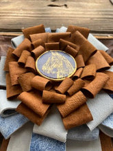 small leather ribbon clutch