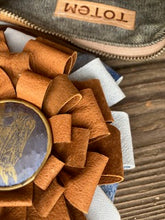 small leather ribbon clutch