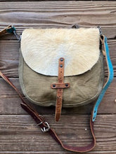 small hair on hide messenger bag
