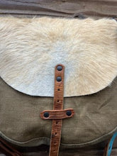 small hair on hide messenger bag