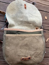 small hair on hide messenger bag
